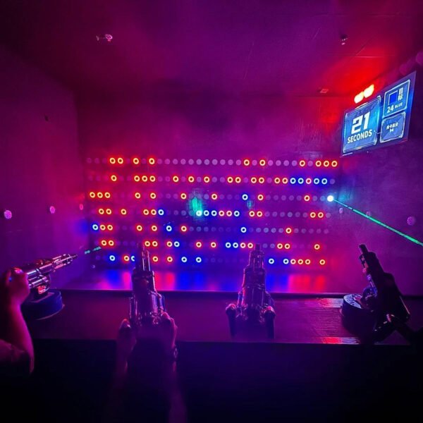 HydroBlaster – Gel Strike Shooting game event with four players aiming gel blasters at LED targets