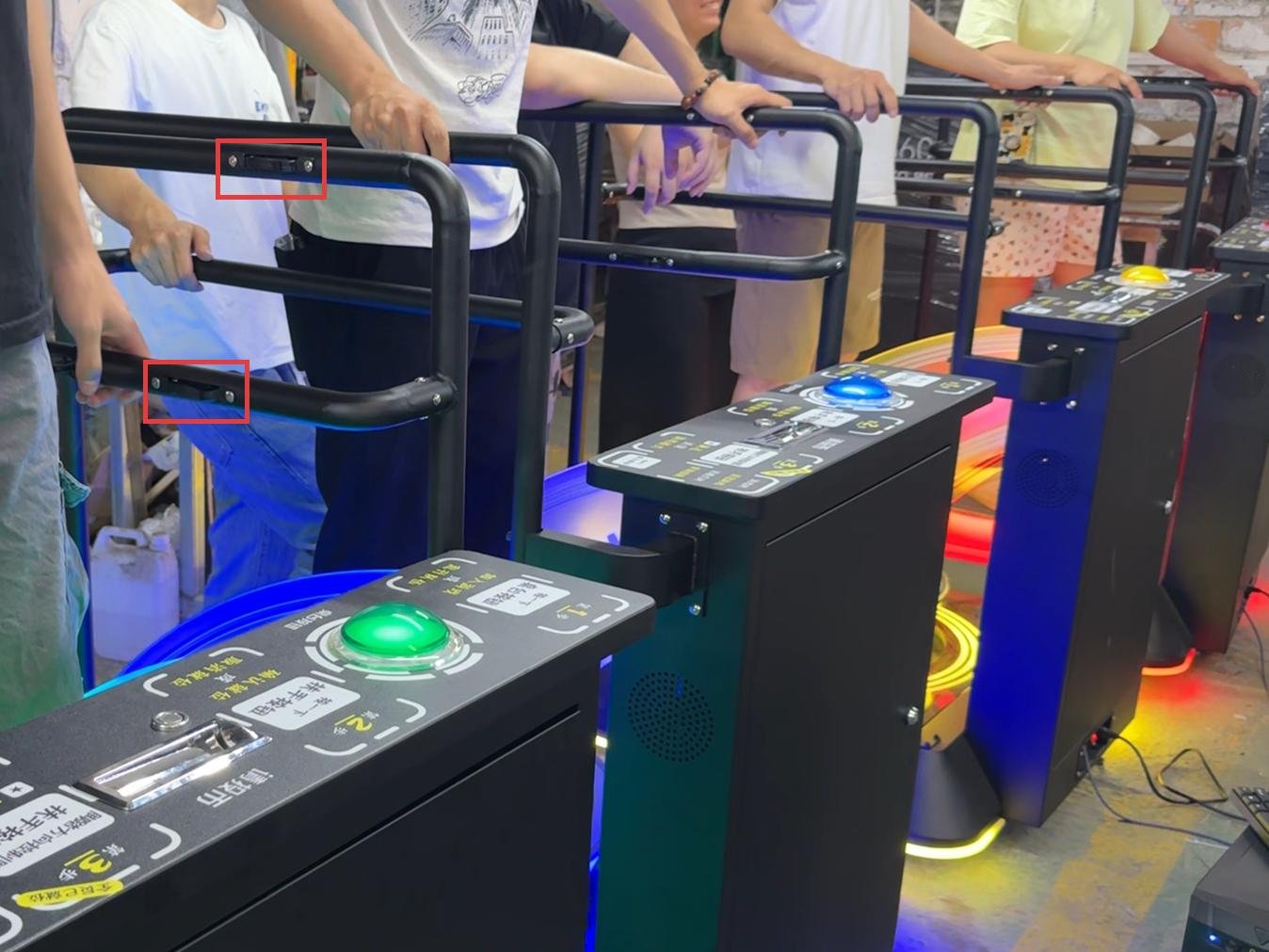 The interactive motion platform has buttons at different heights on the armrests to accommodate adults and children.