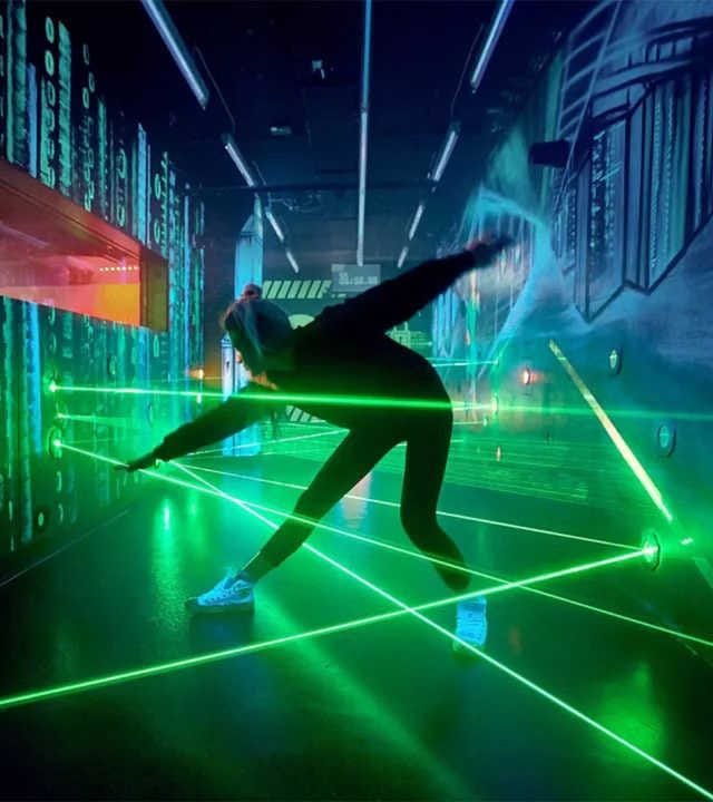 A starlit LED dance floor with a sparkling golden starry sky effect, installed on a stage with a luxurious backdrop.