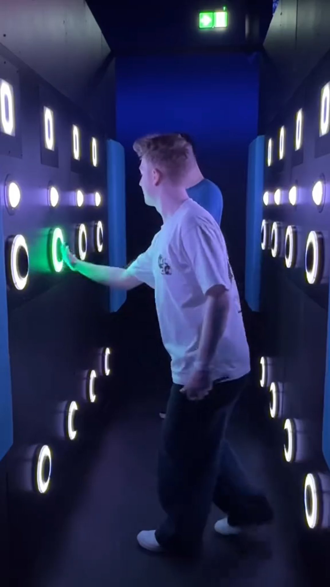In the game of pipe ball, two players work together to put a ball into a lighted pipe.