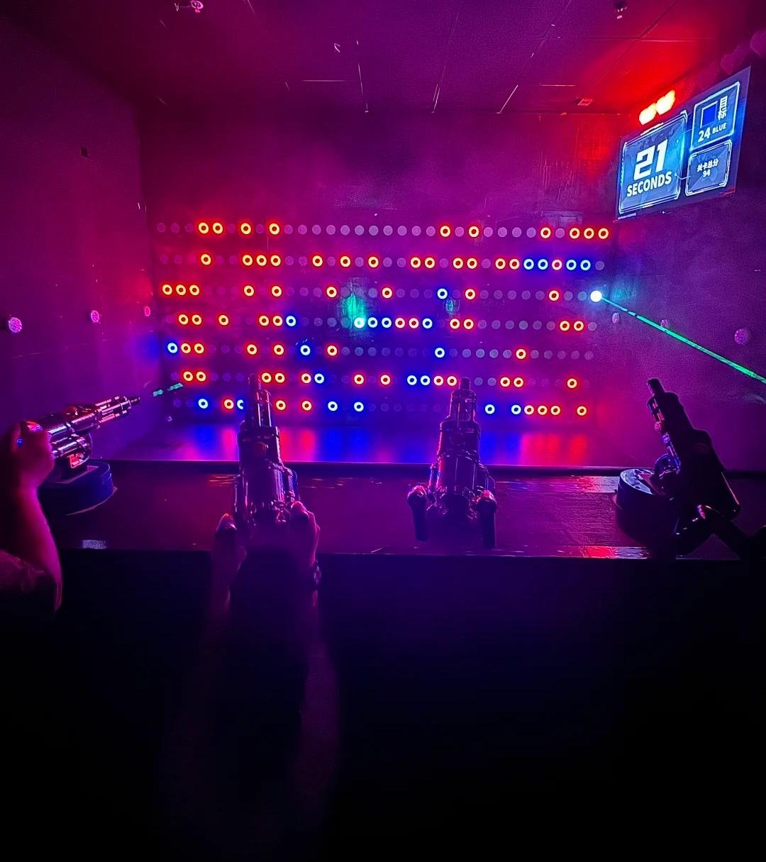 Players aim the laser at the target and shoot